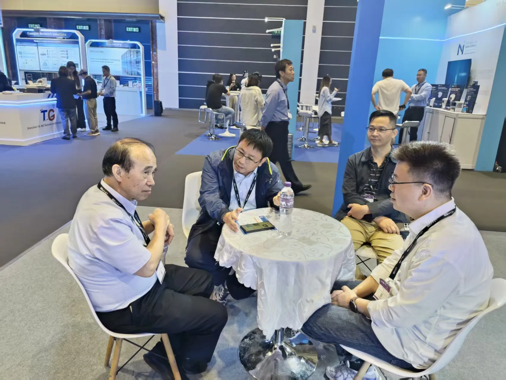 Partner discussion during the Hong Kong exhibition